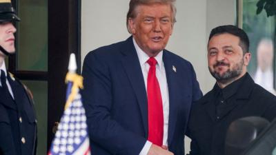 Trump greets Zelensky outside White House