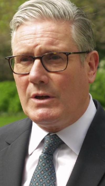 Close-up of Keir Starmer speaking from green area