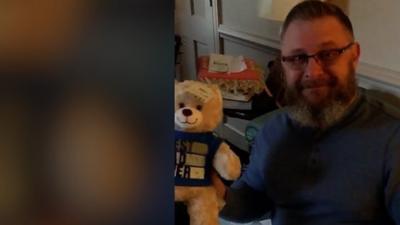 Father with teddy bear