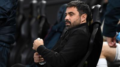 Vitor Matos watches from a pitchside chair