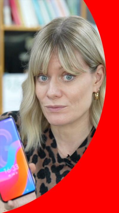 BBC presenter holding phone