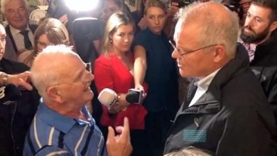 Older man confronts Australian Prime Minster Scott Morrison