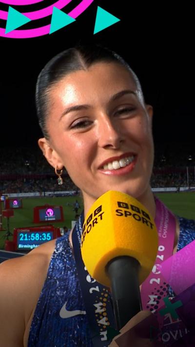 Amy Hunt smiling during her interview after winning gold