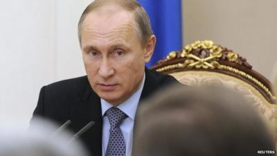 President Vladimir Putin chairs a meeting with members of the Security Council at the Kremlin in Moscow, Russia, 6 November 2015