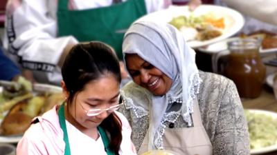 Asylum seekers cooking