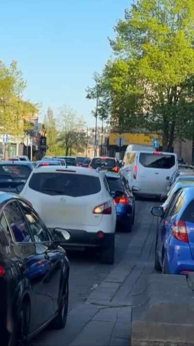 Cars parked on pavement