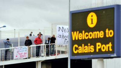 Syrian refugees at a ferry terminal at the Calais port