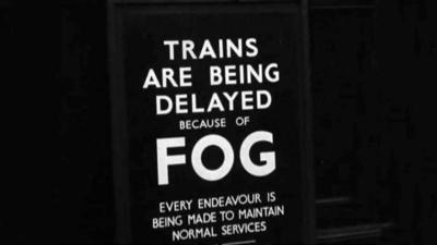 Sign that says 'Trains are being delayed because of fog. Every endeavour is being made to maintain normal services'