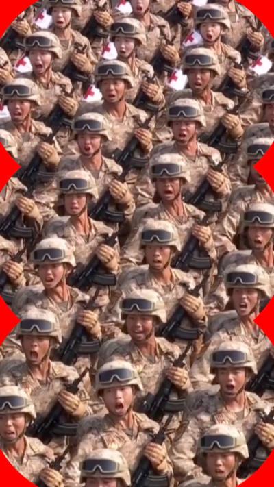 A large group of Chinese soldiers marching with guns