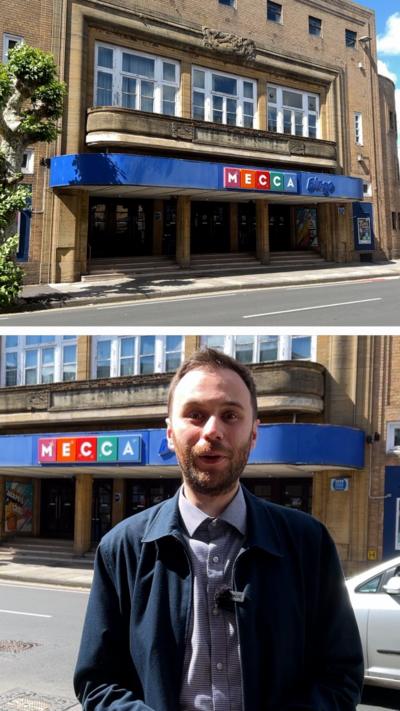 Split image of a historic bingo hall with Mecca sign. The lower screen has a reporter in a shirt and jacket on looking at the camera.