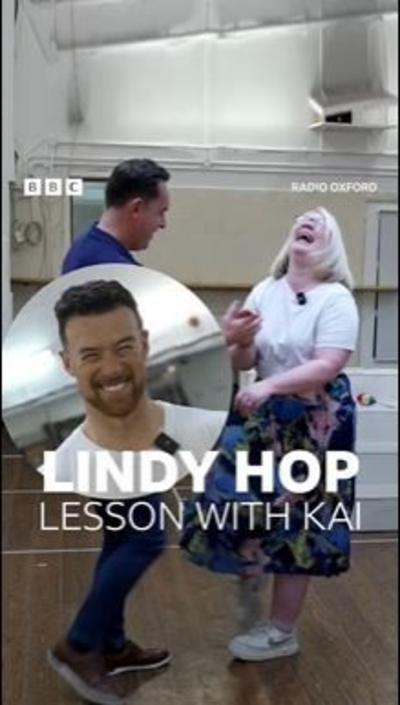 A man and a woman are learning to dance.