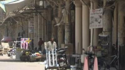 A man walking in Rasheed street in Baghdad