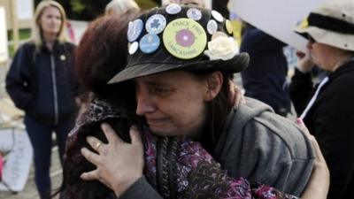 Protesters embrace after fracking application approved in Northallerton