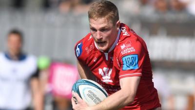 Johnny McNicholl attacks for Scarlets