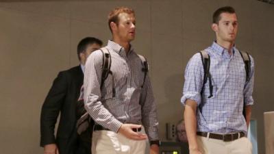 Jack Conger and Gunnar Bentz check in at Rio's international airport