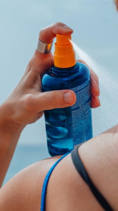 Sun cream being sprayed 