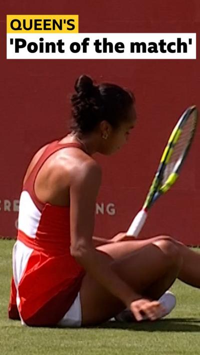 Leylah Fernandez sits on the floor 