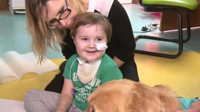 Zoe Relph and her son Oscar with Leo the golden retriever