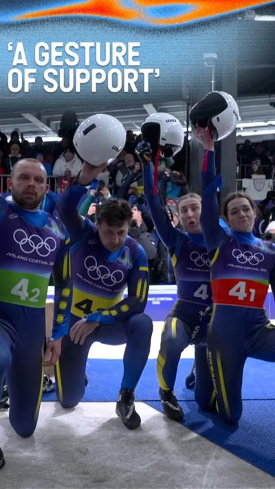 Ukrainian luge squad take the knee in solidarity with teammate, skeleton racer Vladyslav Heraskevych.
