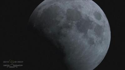 The moon seen partially obscured by the eclipse 