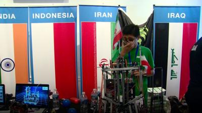 A team of Iranian students finds an inventive way to take part in a US robotics competition.