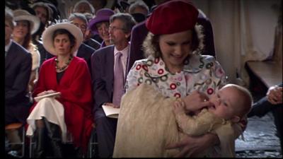 Inés Zorreguieta holding her baby niece at her christening (2007)