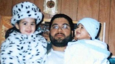 Shaker Aamer with two of his children