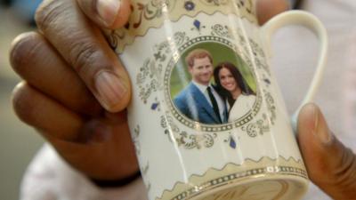 A commemorative mug with Prince Harry and Meghan Markle on it