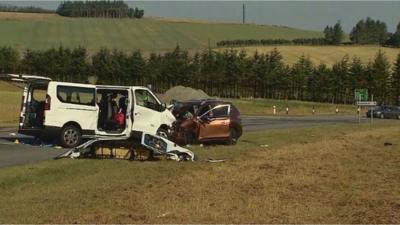 Five people were killed and five others injured when a minibus and 4x4 crashed in Moray.