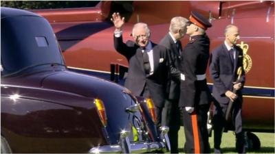 King Charles waving