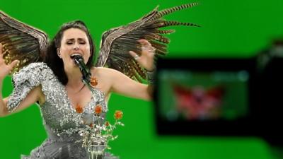 Sharon den Adel of Within Temptation, performing in front of a green screen