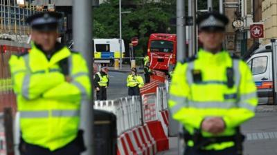 Police officers work near London Bridge