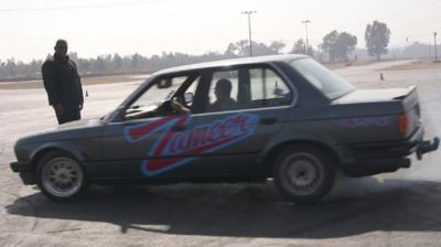 Car and man standing next to it