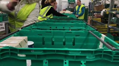 Volunteers working at foodbank