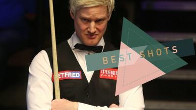 Neil Robertson watches on