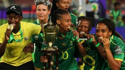 South Africa players celebrate with the Women's Africa Cup of Nations trophy