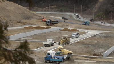 Towns being rebuilt away from the coast