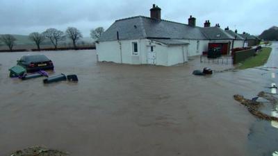 House under flooded river water