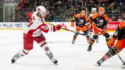 Brodie Reid shoots for Cardiff Devils against Sheffield Steelers