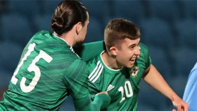 Paul O'Neill celebrates his goal against Ukraine