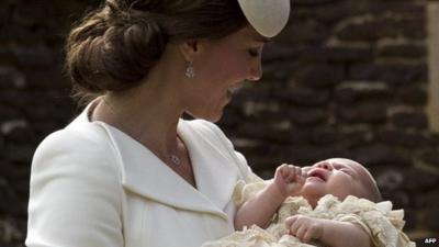 Duchess of Cambridge holding Princess Charlotte