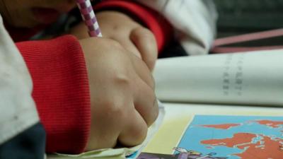 Zhan Jiayue, 9, left behind by her parents