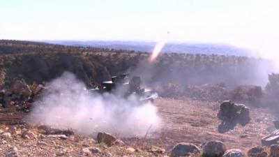 Kurdish forces firing rockets towards Sinjar