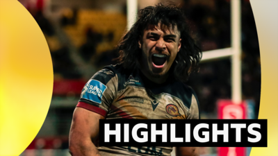 Catalans Dragons' Solomona Faataape celebrates scoring a try against Huddersfield.