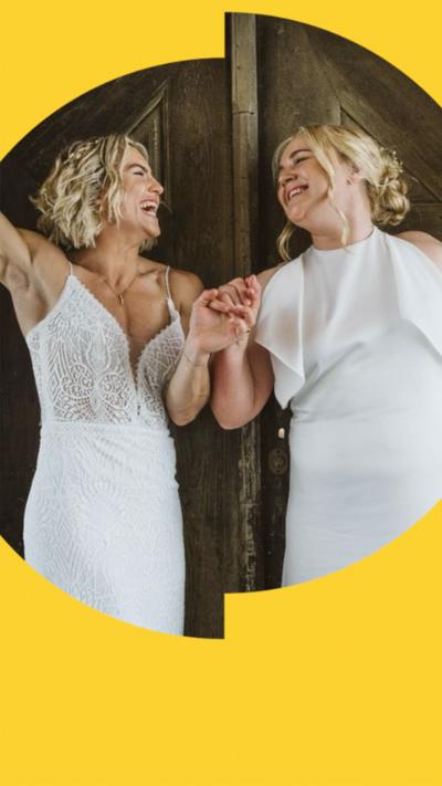 England's Claudia Moloney-MacDonald and Ireland's Cliodhna Moloney-MacDonald in their wedding dresses holding hands