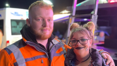 Paul and Harley at Bridgwater Carnival. Paul has his arm around Harley. Both of them are looking at the camera and smiling. 