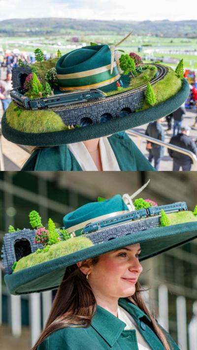 Split image of a women standing tall. She has a huge green hat on with a model railway and train.
