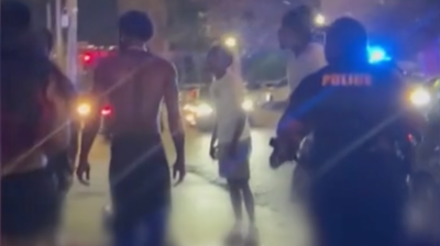 People standing on street after shooting