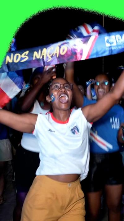 Cape Verde fans celebrating progressing to the knockout stages of the FIFA World Cup.