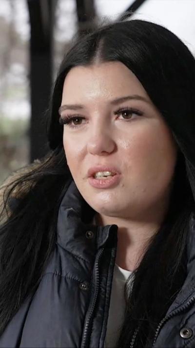 Close up of young woman with dark hair